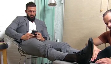 Handsome bearded businessman foot licked and worshipped